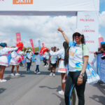 Prudential Kenya presenting a Ksh. 10 million cheque to support the 5KM Family Run at the Standard Chartered Nairobi Marathon